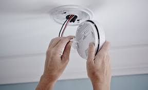 hardwired smoke detector beeping